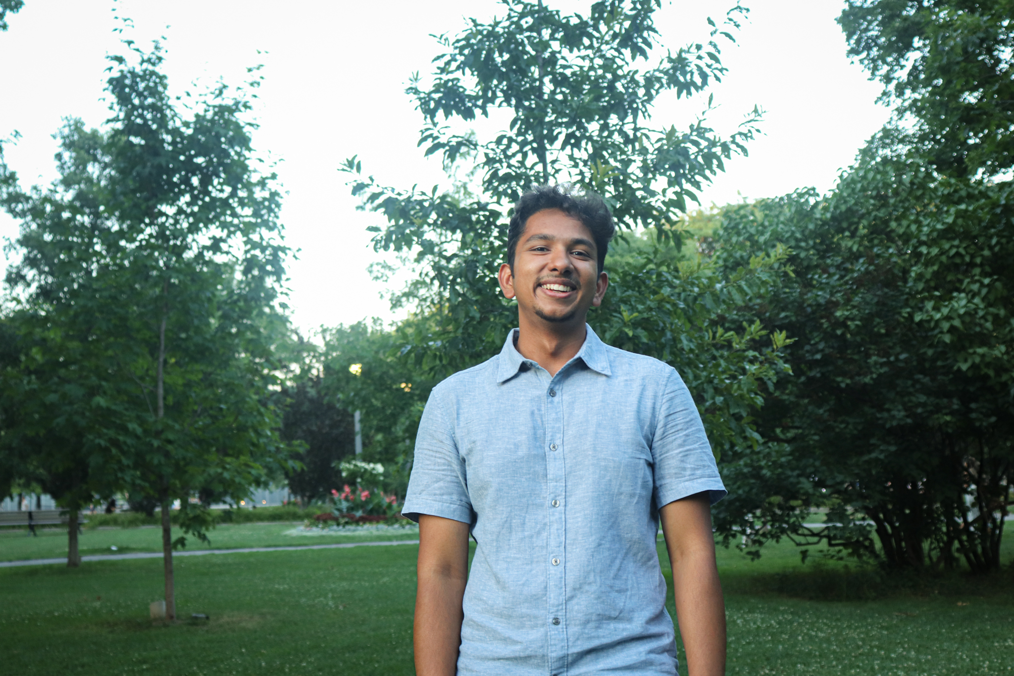 Portrait of Aditya Balaji in a cinematic outdoor setting
